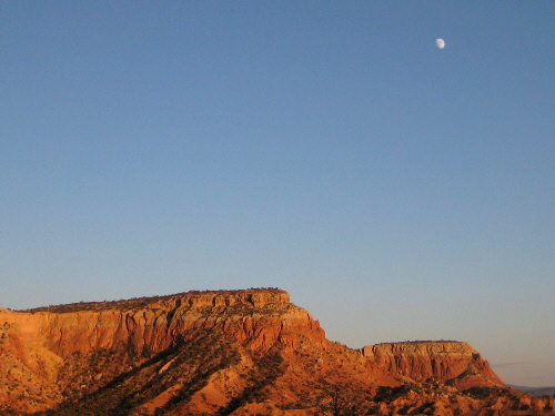 Moon over Kitchen Mesa, the moon at dusk at Ghost Ranch, August 1, 2009, photo © 2009 by ybonesy, all rights reserved